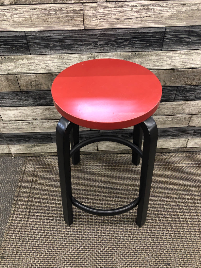 BLACK WOOD BASE W RED SEAT STOOL.