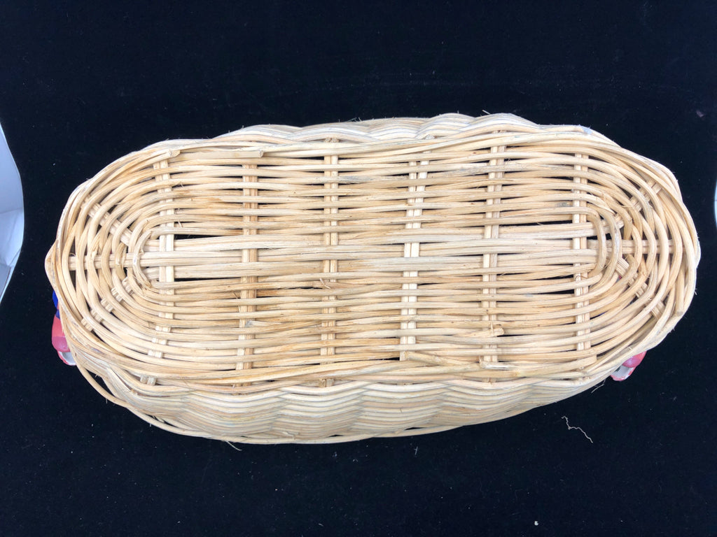 OVAL BLONDE BASKET W/ GREEN TRIM CERAMIC SALMON HANDLES.