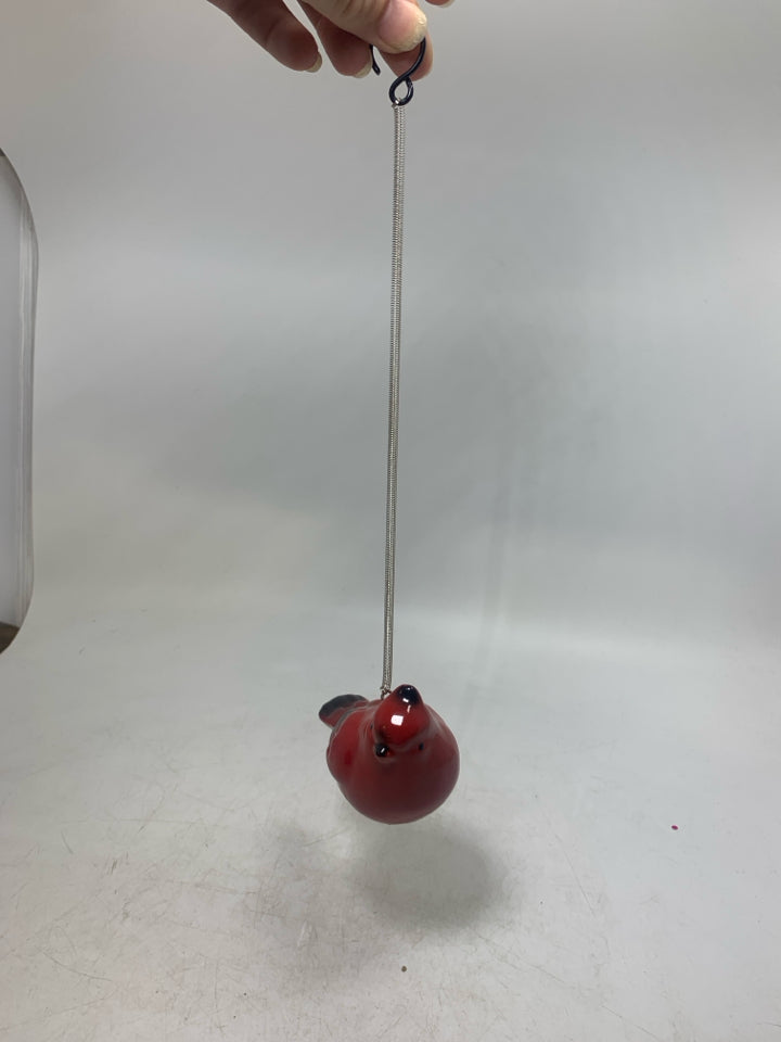 RED CERAMIC CARDINAL ON BUNGLE STRING.