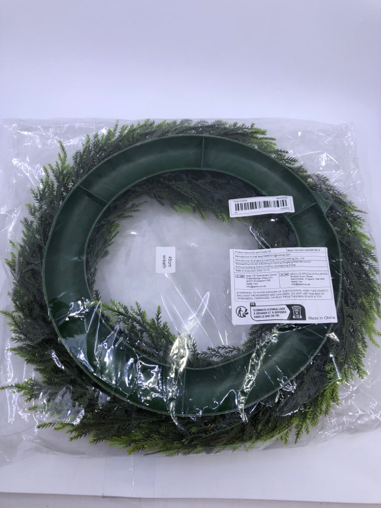 NIP FAUX GREENS WREATH.
