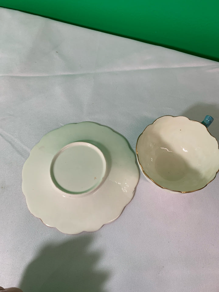 VTG CREAM AND GOLD ACCENT TEACUP AND SAUCER.