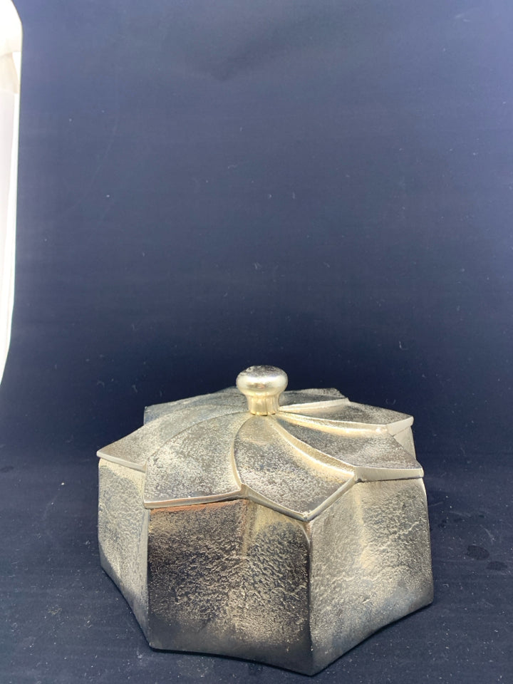 MATTE SILVER METAL FLOWER SHAPED CANISTER.