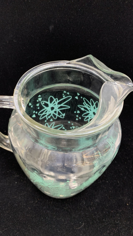 VTG TEAL STARBURST GLASS PITCHER W/ICE LIP.