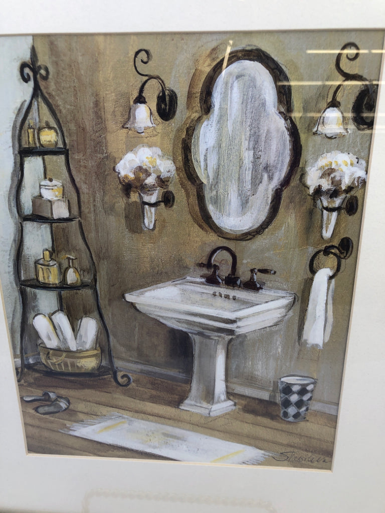 BATHROOM SINK W ORNATE SILVER FRAME.