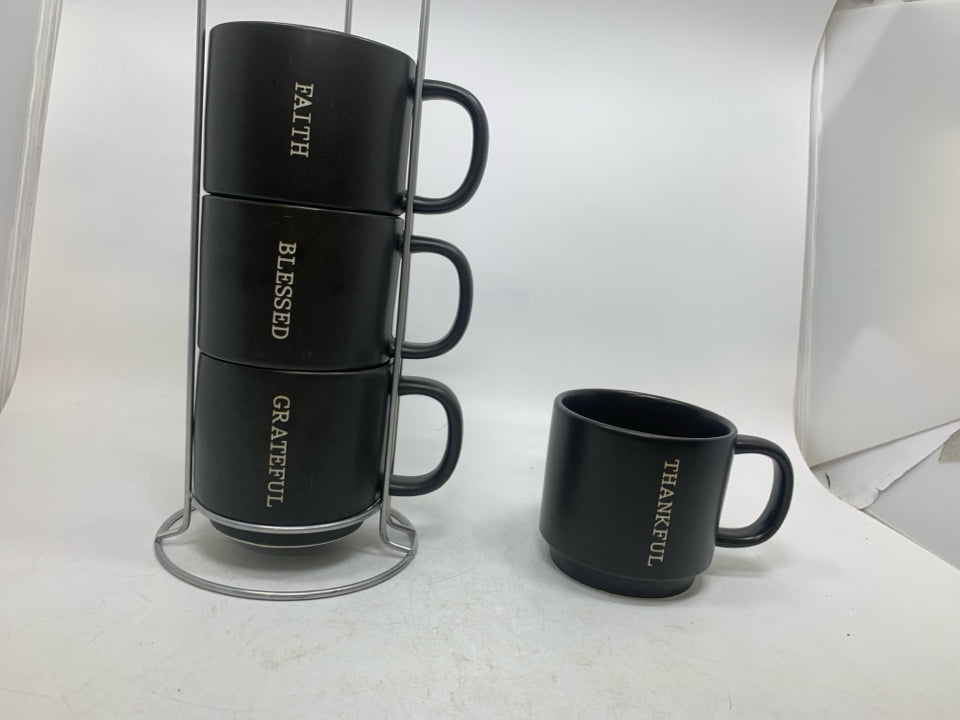 4 STACKING MUGS IN HOLDER.