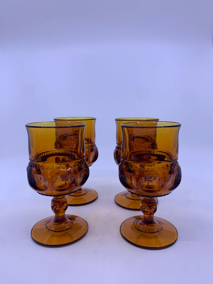 4 VTG AMBER GLASS GOBLETS.