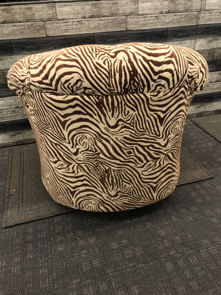 BROWN ZEBRA SWIVEL CHAIR.