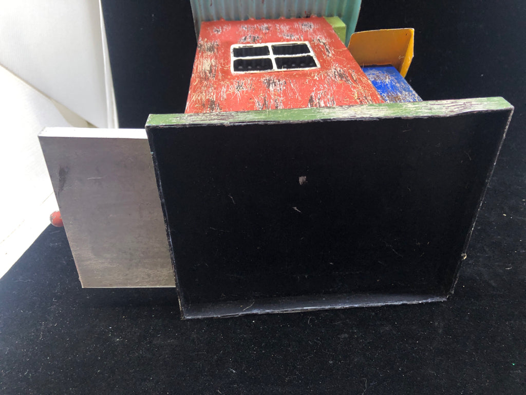 MULTI COLORED TIN BIRD HOUSE W/ PULL OUT TRAY/HEART CUT OUT.