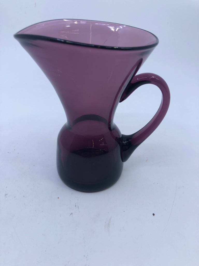 SMALL PURPLE GLASS WIDE TOP PITCHER.