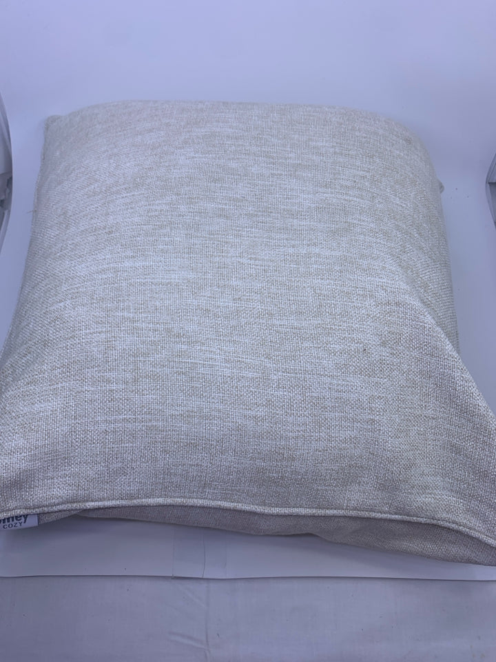 BEIGE TEXTURED ACCENT PILLOW.