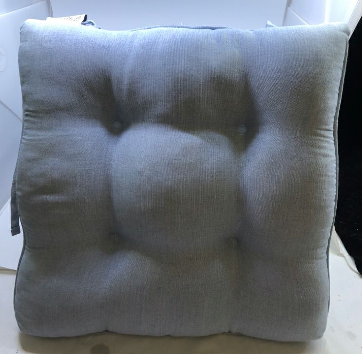 4 LIGHT BLUE CUSHIONS.