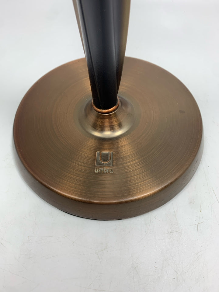 BRONZE AND BLACK PLASTIC PAPER TOWEL HOLDER.