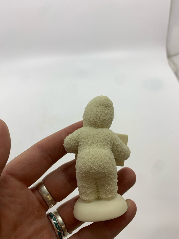 SMALL SNOWBABY HOLDING ENVELOPE W/ RED HEART.