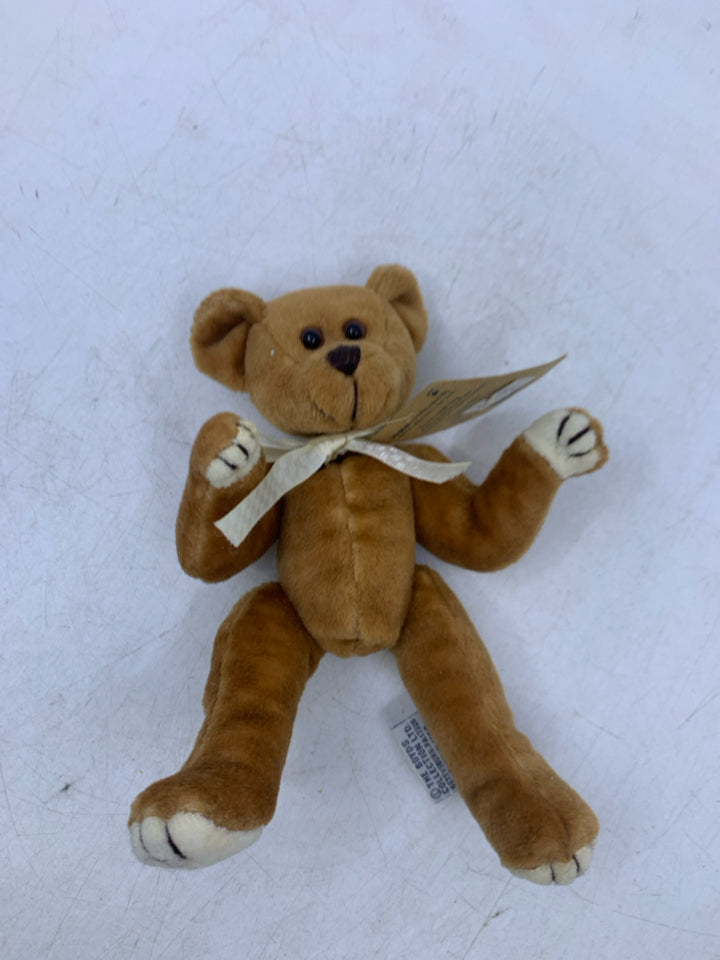 MINI LIGHT BROWN BEAR W/ WHITE BOW.