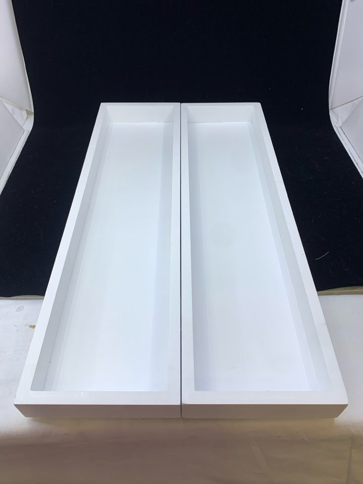 2 WHITE FLOATING SHELVES.