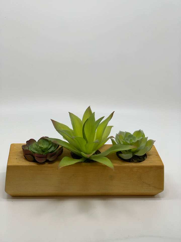 FAUX SUCCULENTS IN WOOD BLOCK.