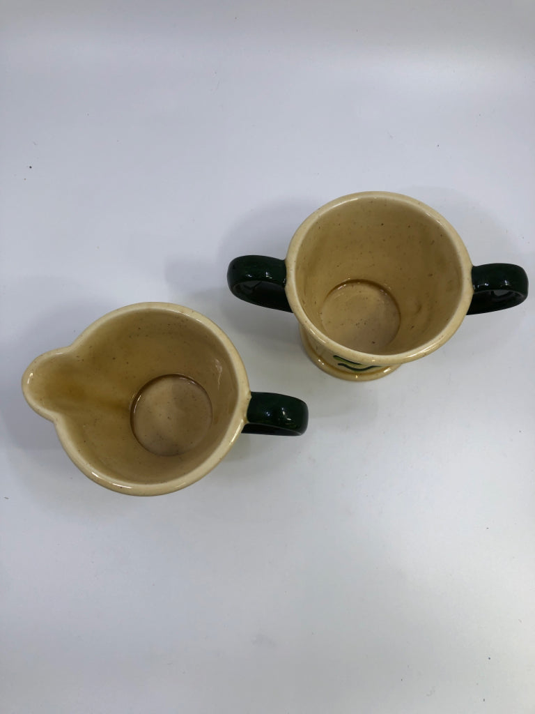 VTG farm AND MILK LADY SUGAR CREAMER SET TAN W/GREEN HANDLES.