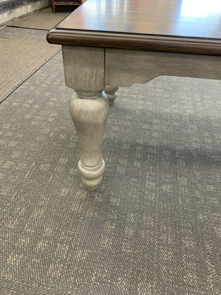 DARK WOOD TOP W GREY DISTRESSED LEGS COFFEE TABLE.