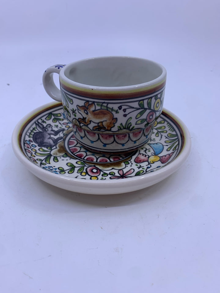 MEXICAN POTTERY FLORAL PATTERN W RABBIT TEACUP AND SAUCER.