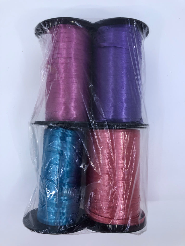 4 SPOOLS OF RIBBON PURPLE,PINK,BLUE,RED IN BAG.