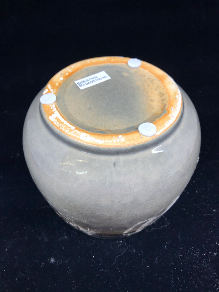 GREY GLOBE SHAPED PLANTER W/IRIDESCENT RIM.