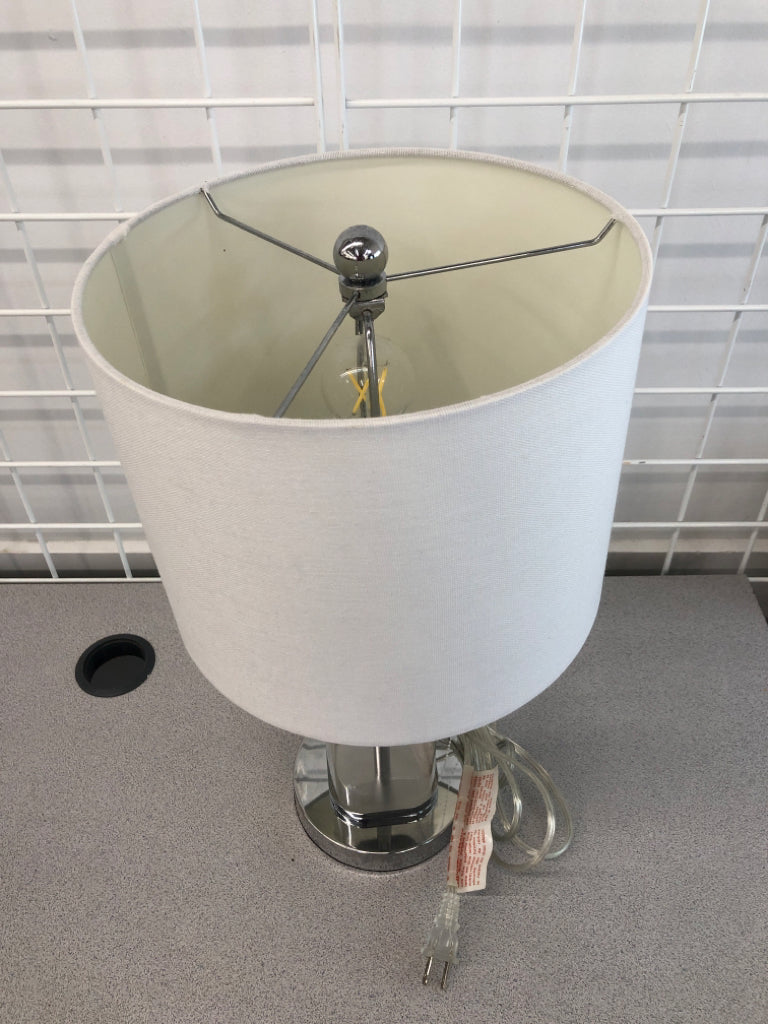 CLEAR BASE METAL LAMP W/CANVAS SHADE.