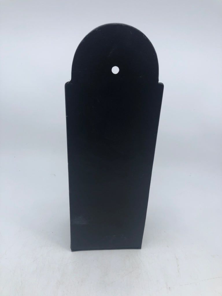 METAL BLACK WALL POCKET W/ EMBOSSED STAR.