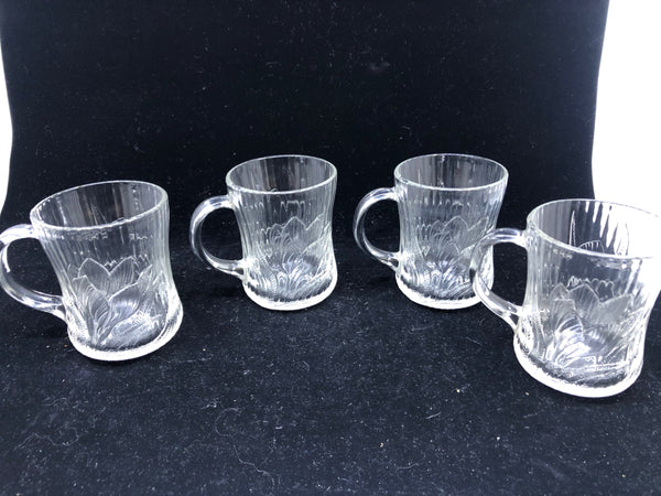 4 GLASS FLORAL MUGS.