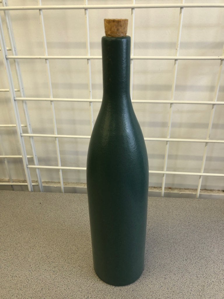 GREEN PORCELAIN BOTTLE WITH CORK.