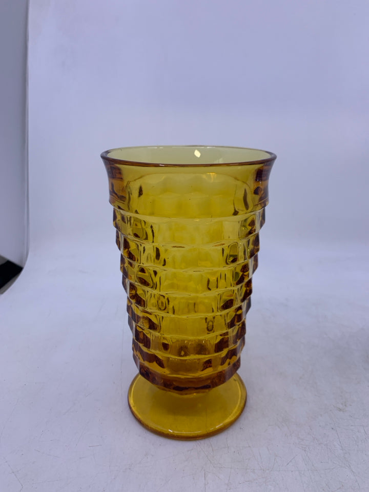 TEXTURED AMBER GLASS FOOTED VASE.
