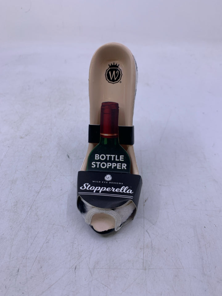 RESIN HIGH HEEL WHINE STOPPER.