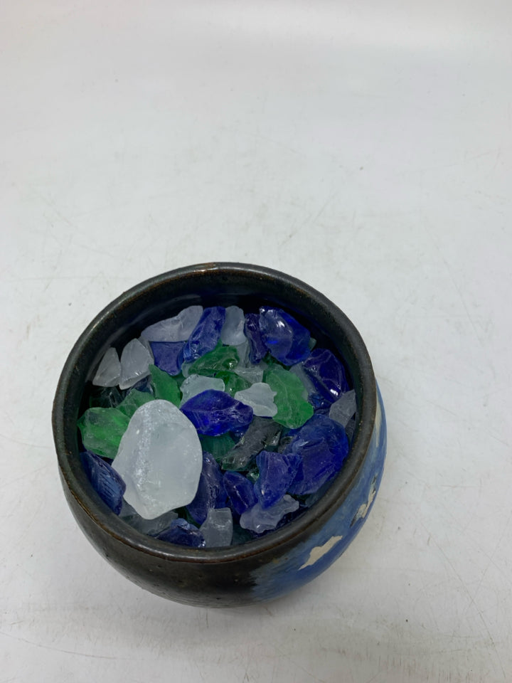 DARK PLANTER W/ PAINTED LIGHT HOUSE FILLER W/ SEA GLASS IN BAG.