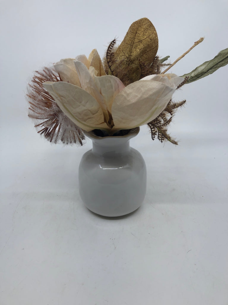 FAUX FLORAL IN WHITE VASE.