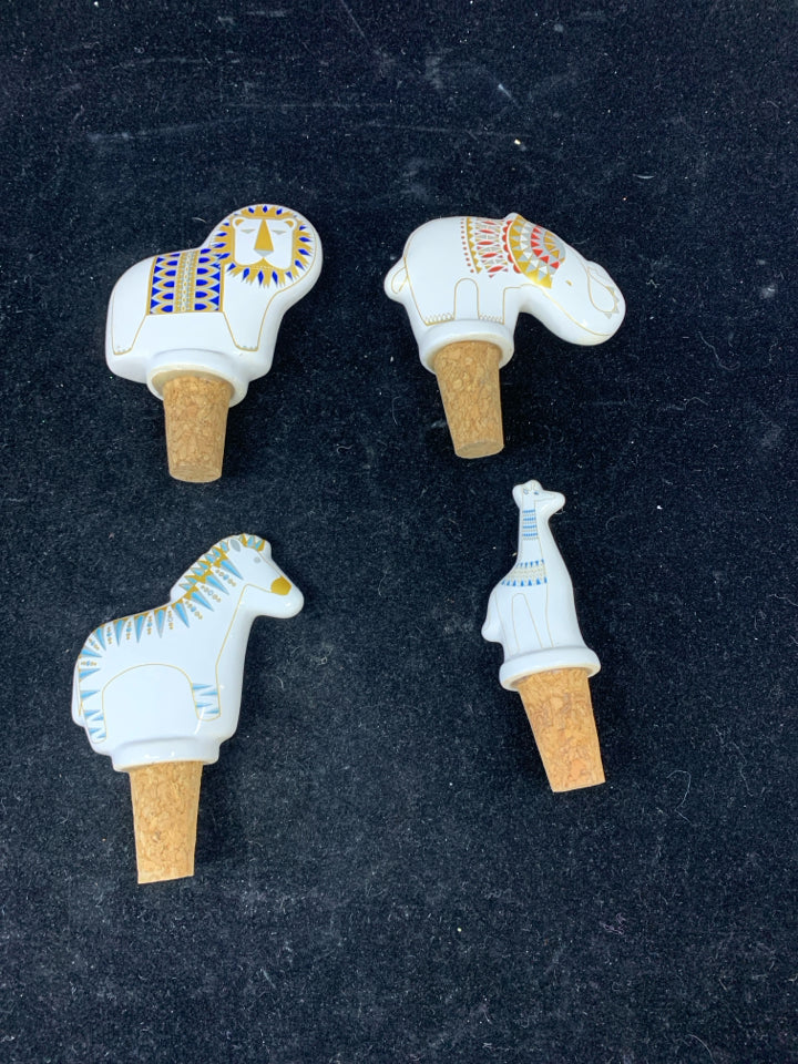 4 CERAMIC ANIMALS WINE STOPPERS.