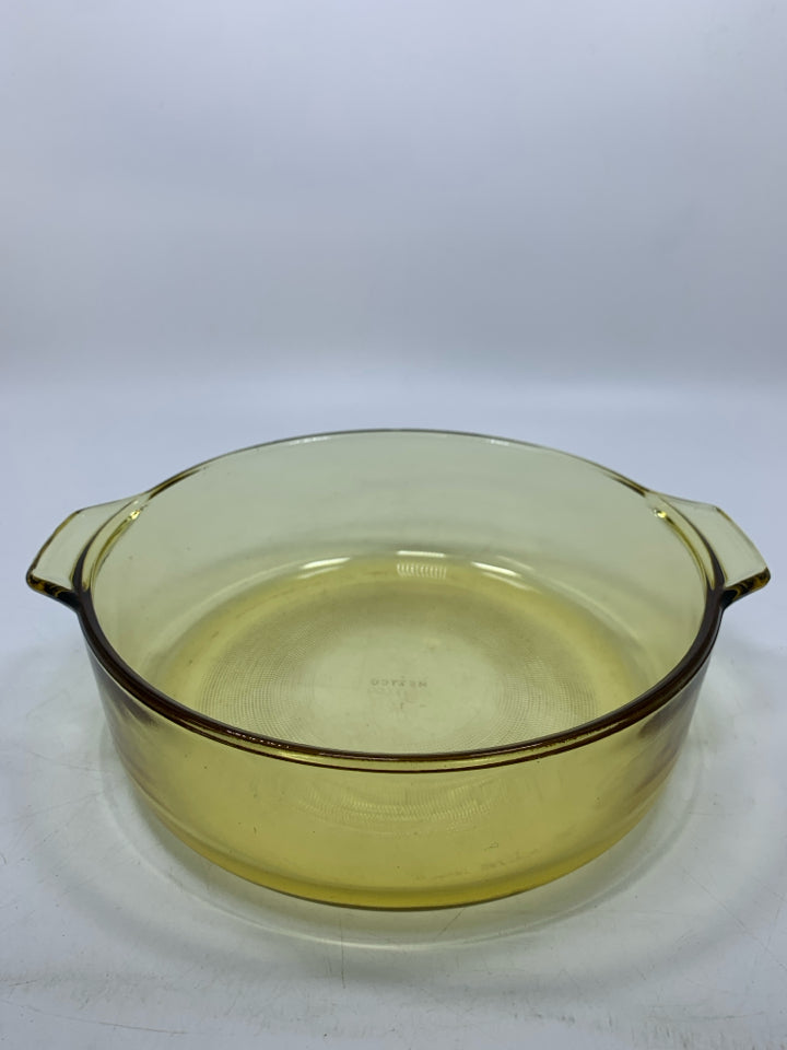 VTG DYNAWARE YELLOW GLASS CIRCLE BAKING DISH W/ HANDLES.