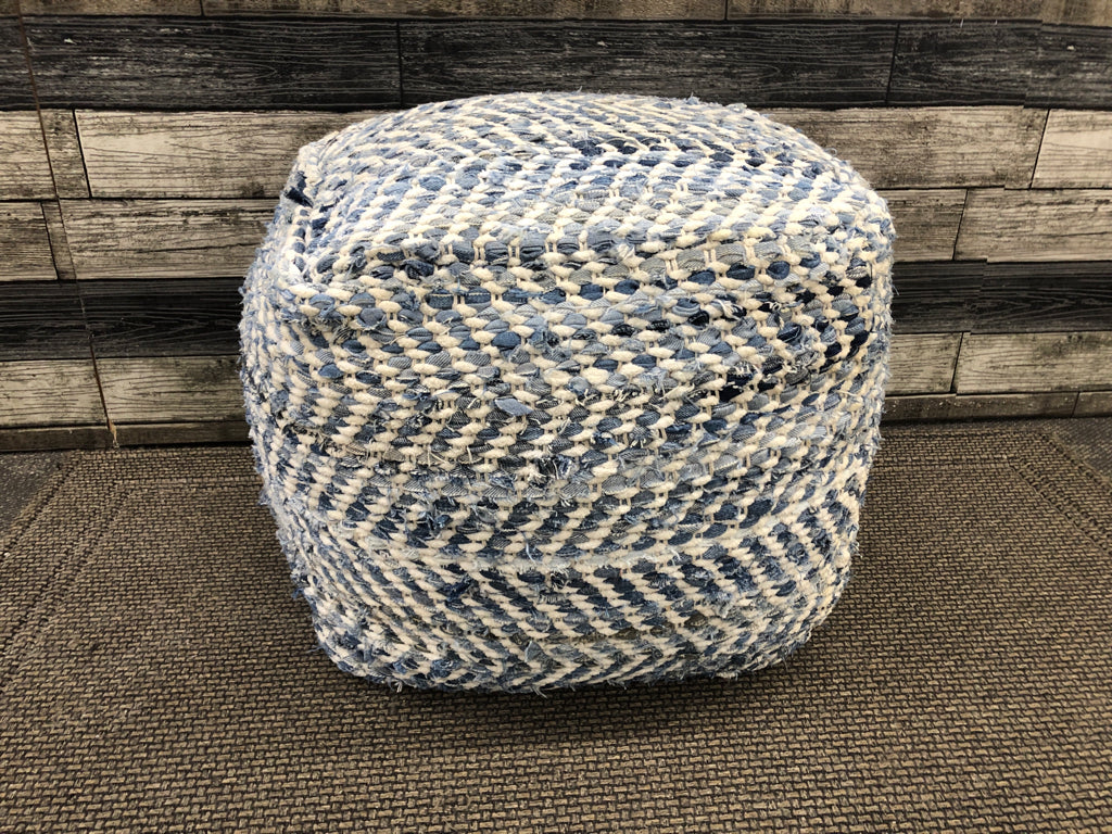 BLUE AND WHITE OTTOMAN.