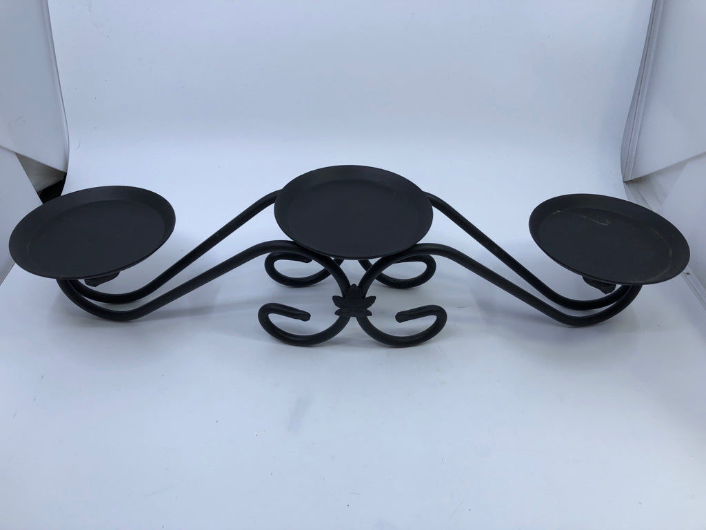 TRIPLE WROUGHT IRON CANDLE HOLDER.