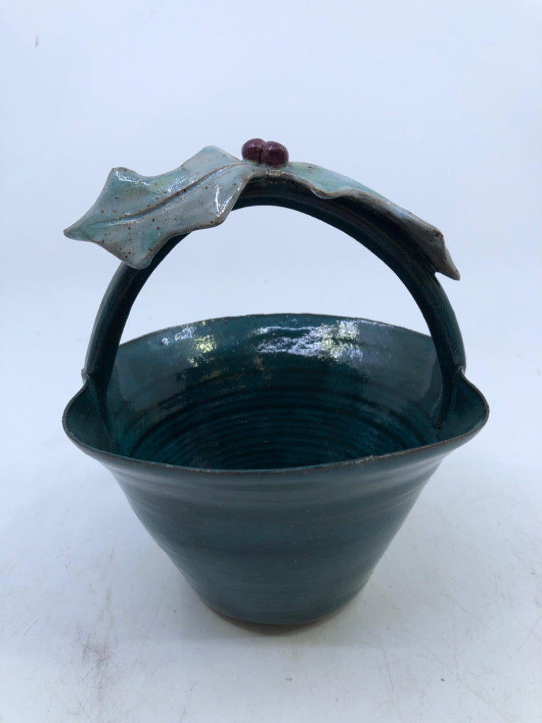 GREEN/TEAL POTTERY BASKET W/ EMBOSSED HOLLY.