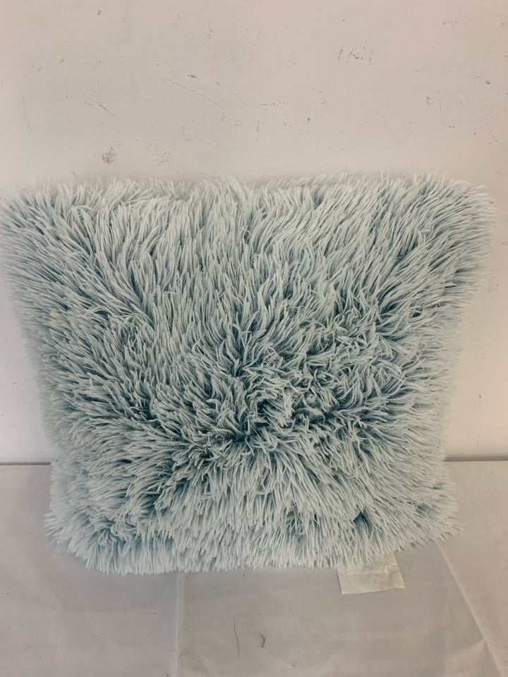 TEAL FAUX FUR PILLOW.