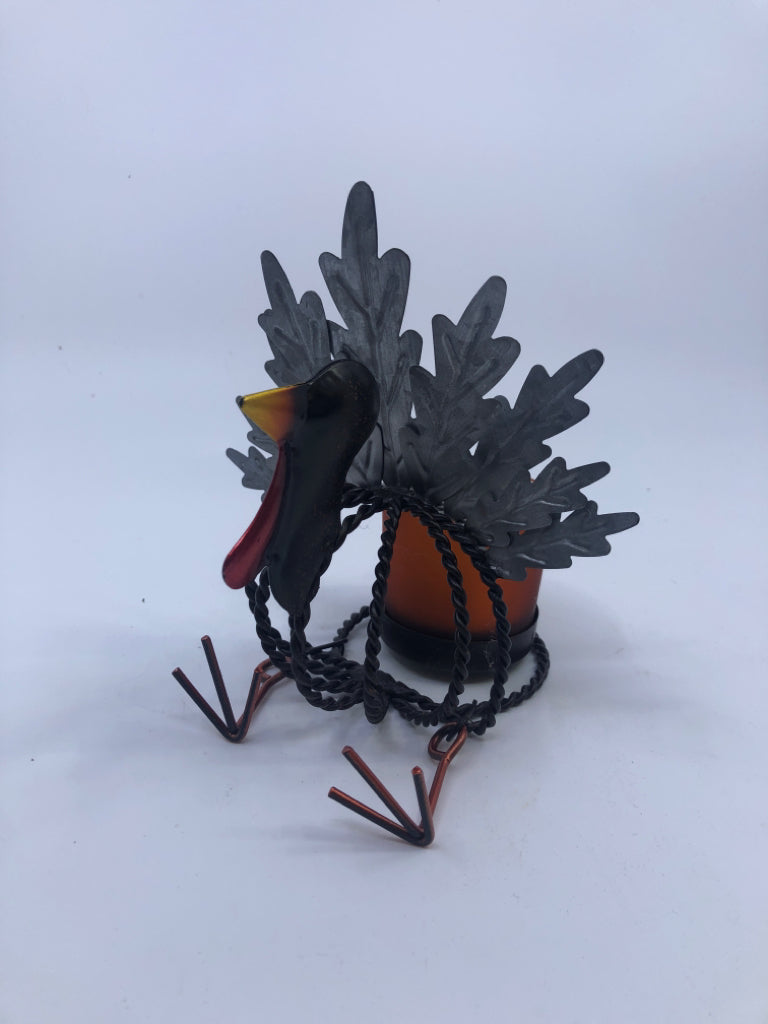 METAL TURKEY CANDLE HOLDER.