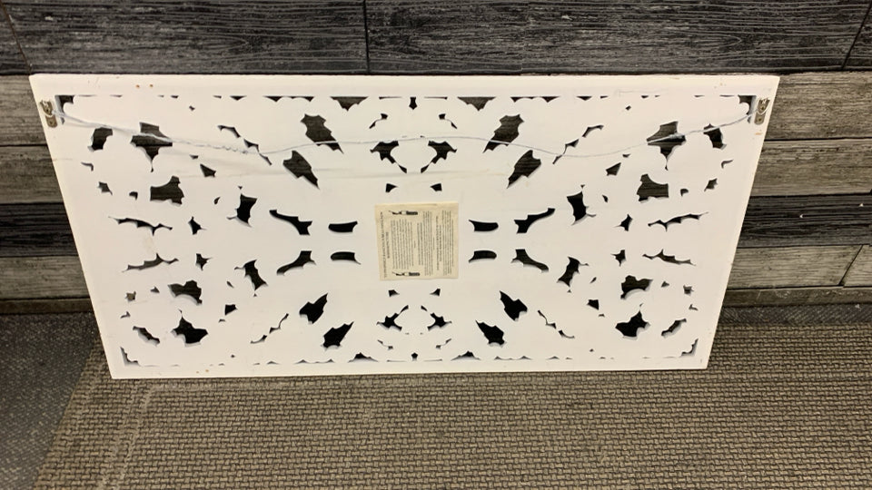 DISTRESSED WHITE CARVED WOODEN FLORAL PANEL.