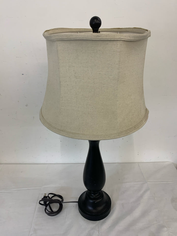 BROWN WOODEN LAMP W/CREAM SHADE.