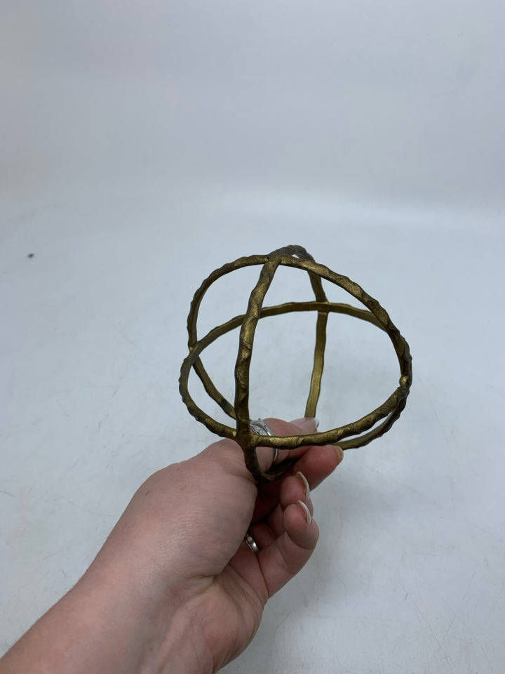 GOLD METAL SEE THROUGH SPHERE DESK DECOR.