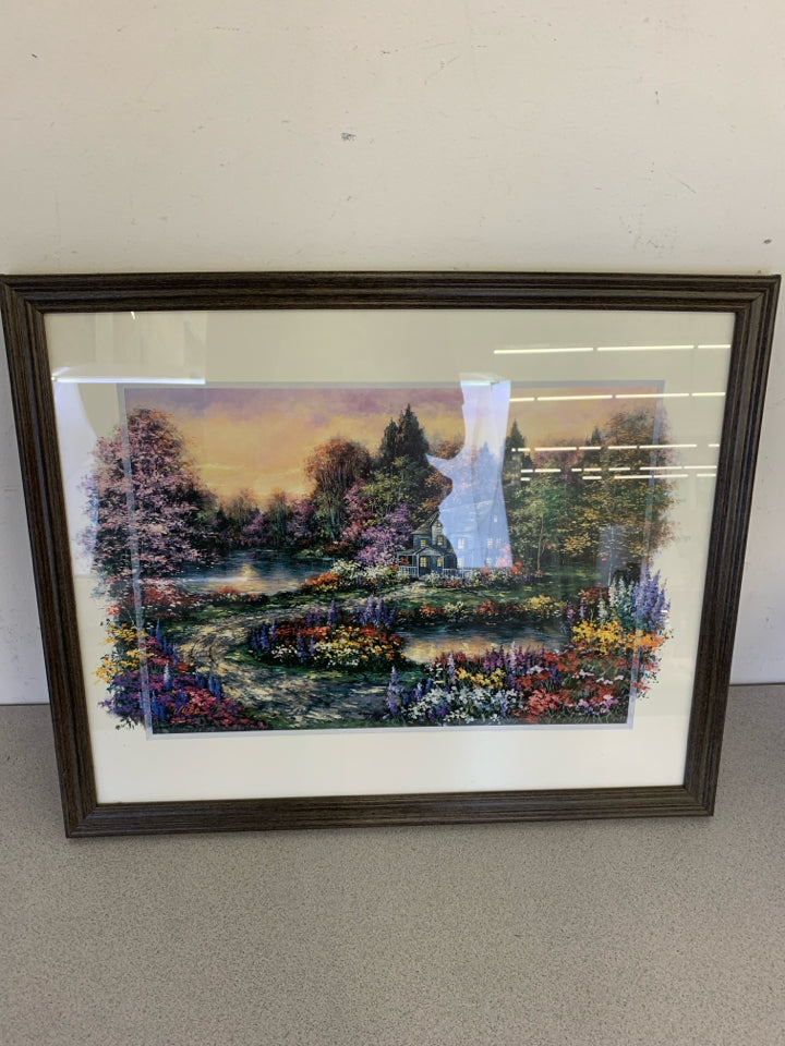 COLORFUL FLORAL COTTAGE SCENE IN DARK FRAME.