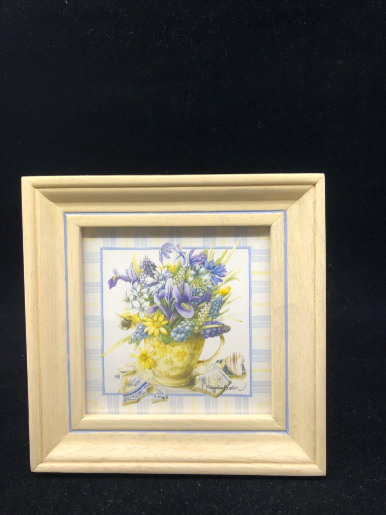 PURPLE FLORAL IN CREAM FRAME WALL HANGING.