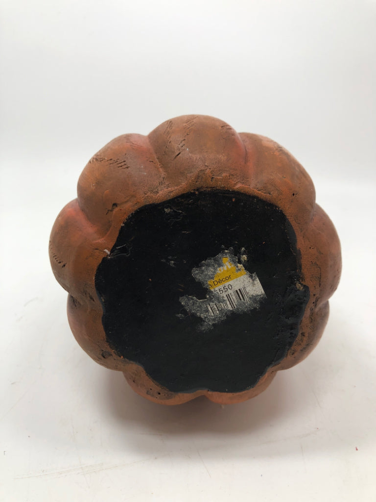 ORANGE PAINTED RESIN PUMPKIN.