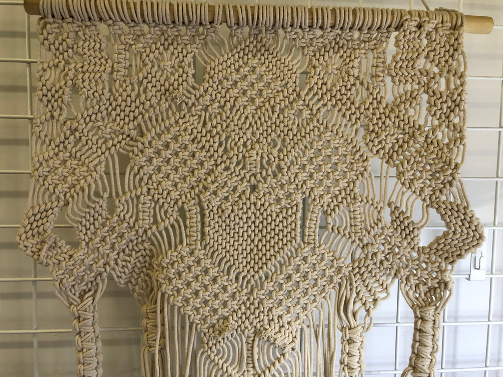 MACRAME DIAMOND PATTERN WALL DECOR.