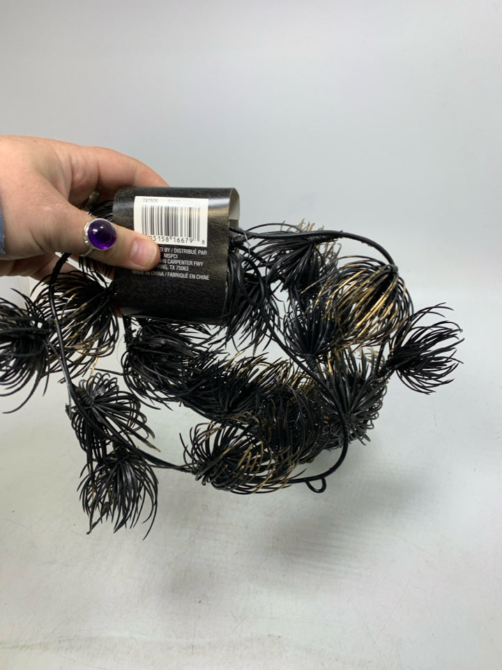 NEW BLACK COILED GARLAND.