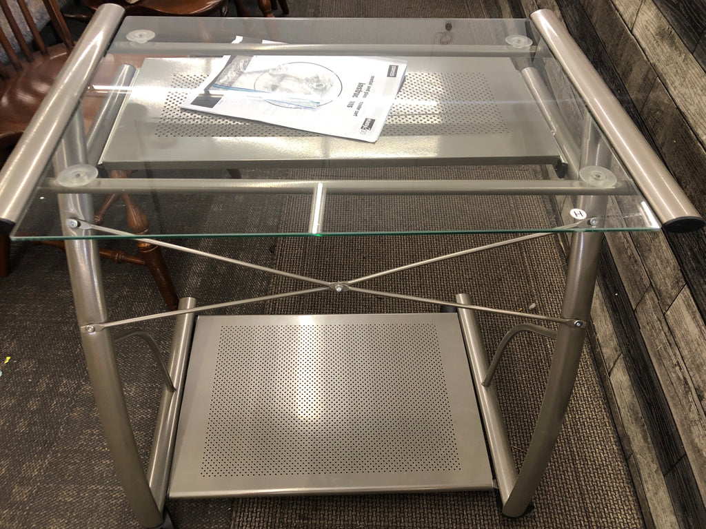 GLASS TOP ROLLING DESK.