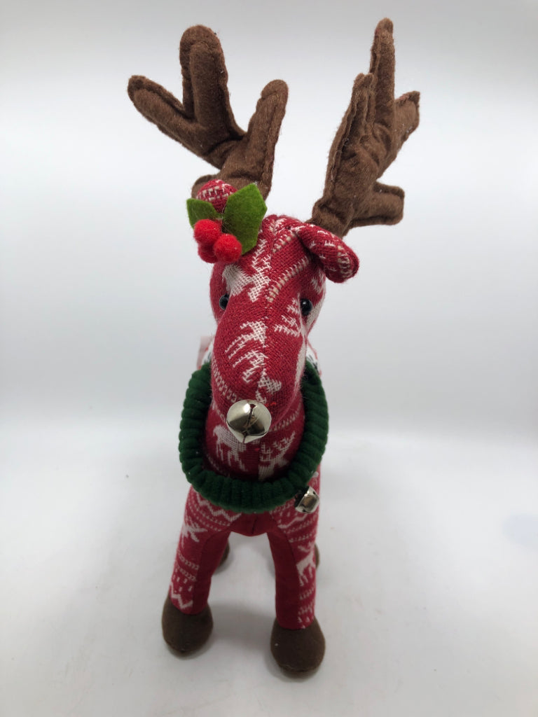 STANDING RED PLUSH REINDEER W/ GREEN COLLARS.